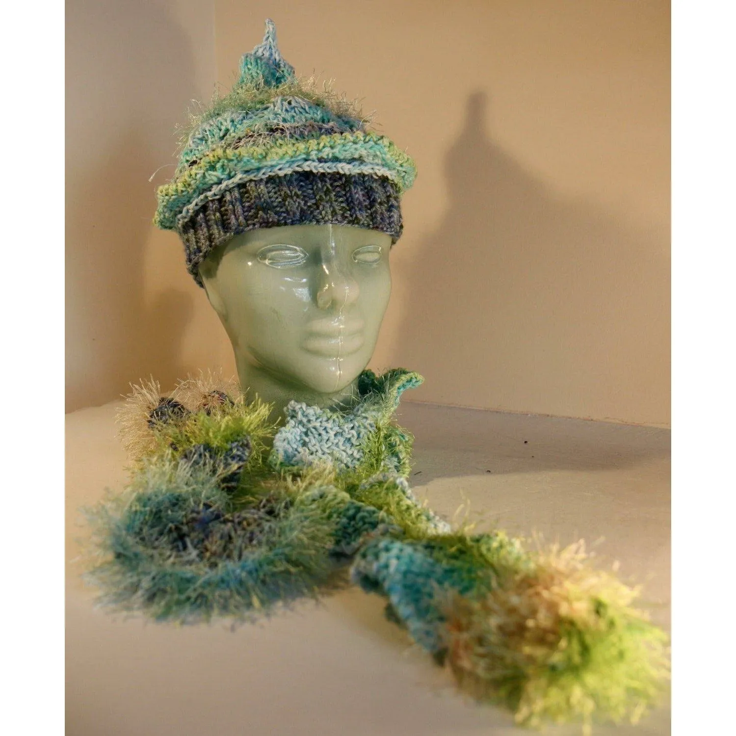 Hand knit pixie hat and scarf in Caribbean ocean blues and cottons.